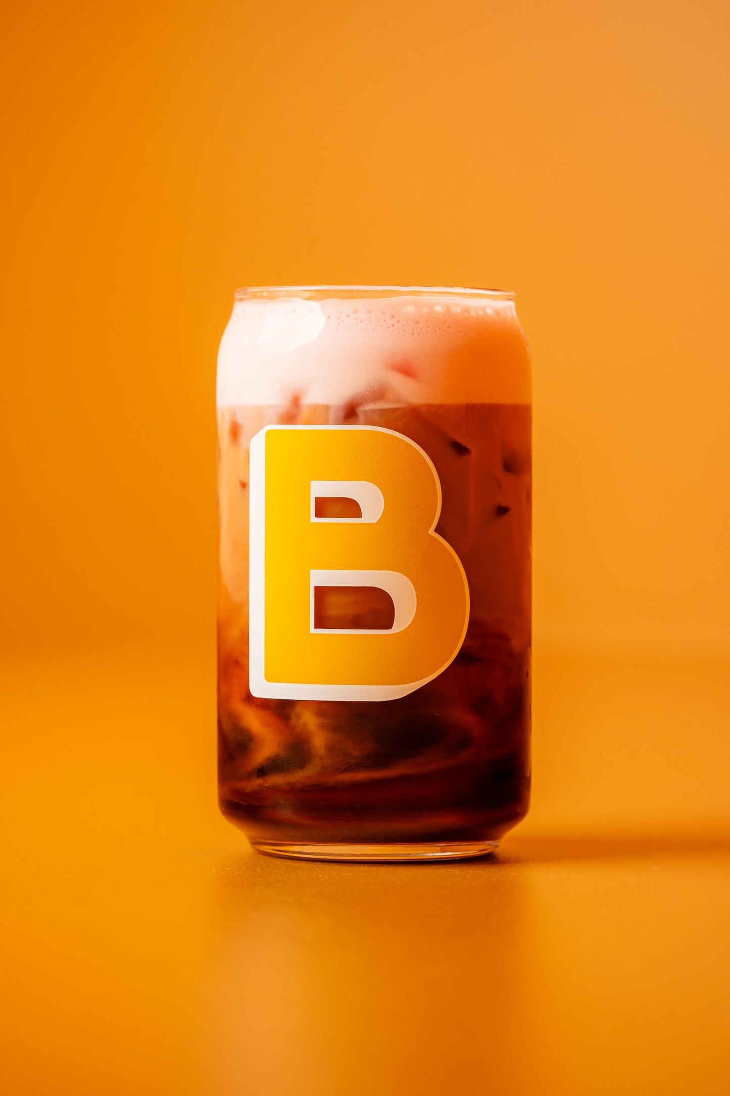 Our signature cold brew glass featuring our iconic yellow B.DESIGNER: Hannah KneisleyEDITION: SUMMER 2023SPEC: 12 fl. ozMATERIAL: GlassFEATURES: Dishwasher Safe