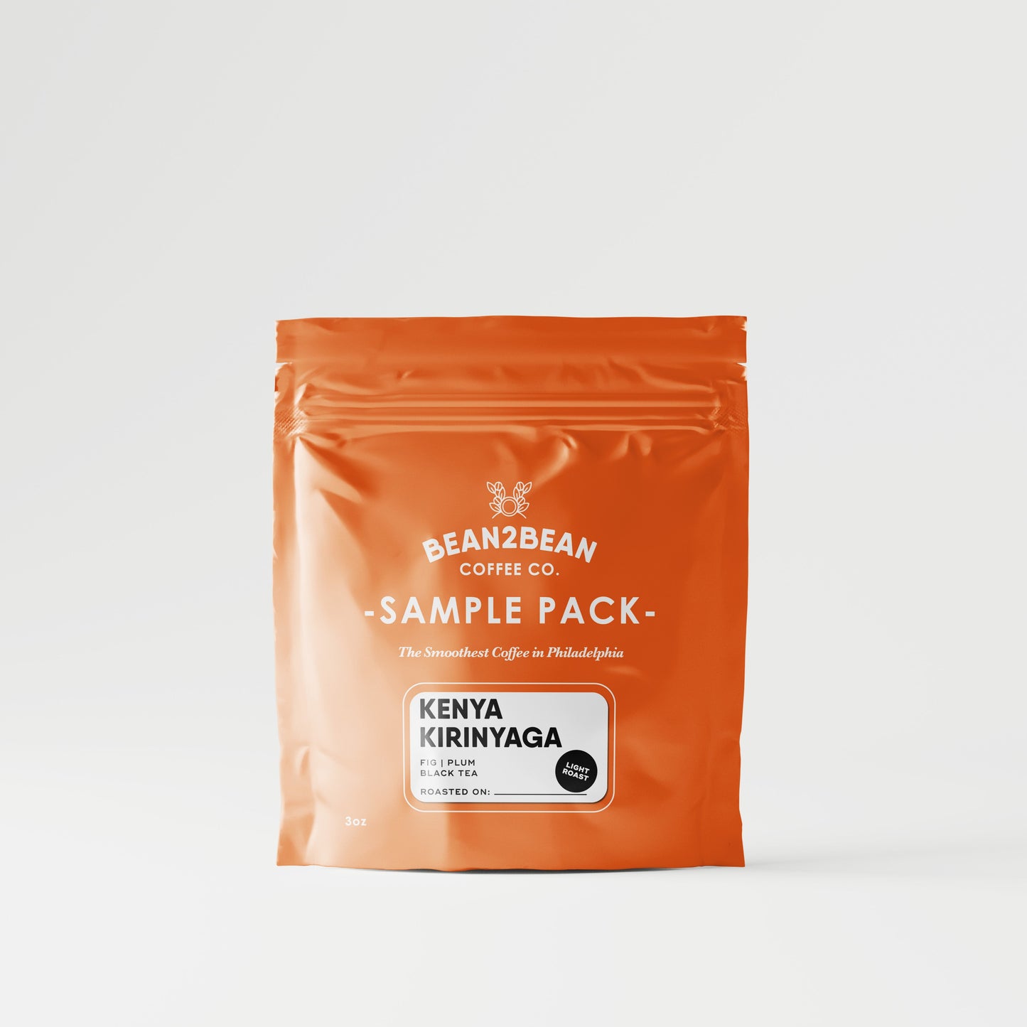 Orange coffee sample pack from Bean & Bean Coffee Co. on a white background