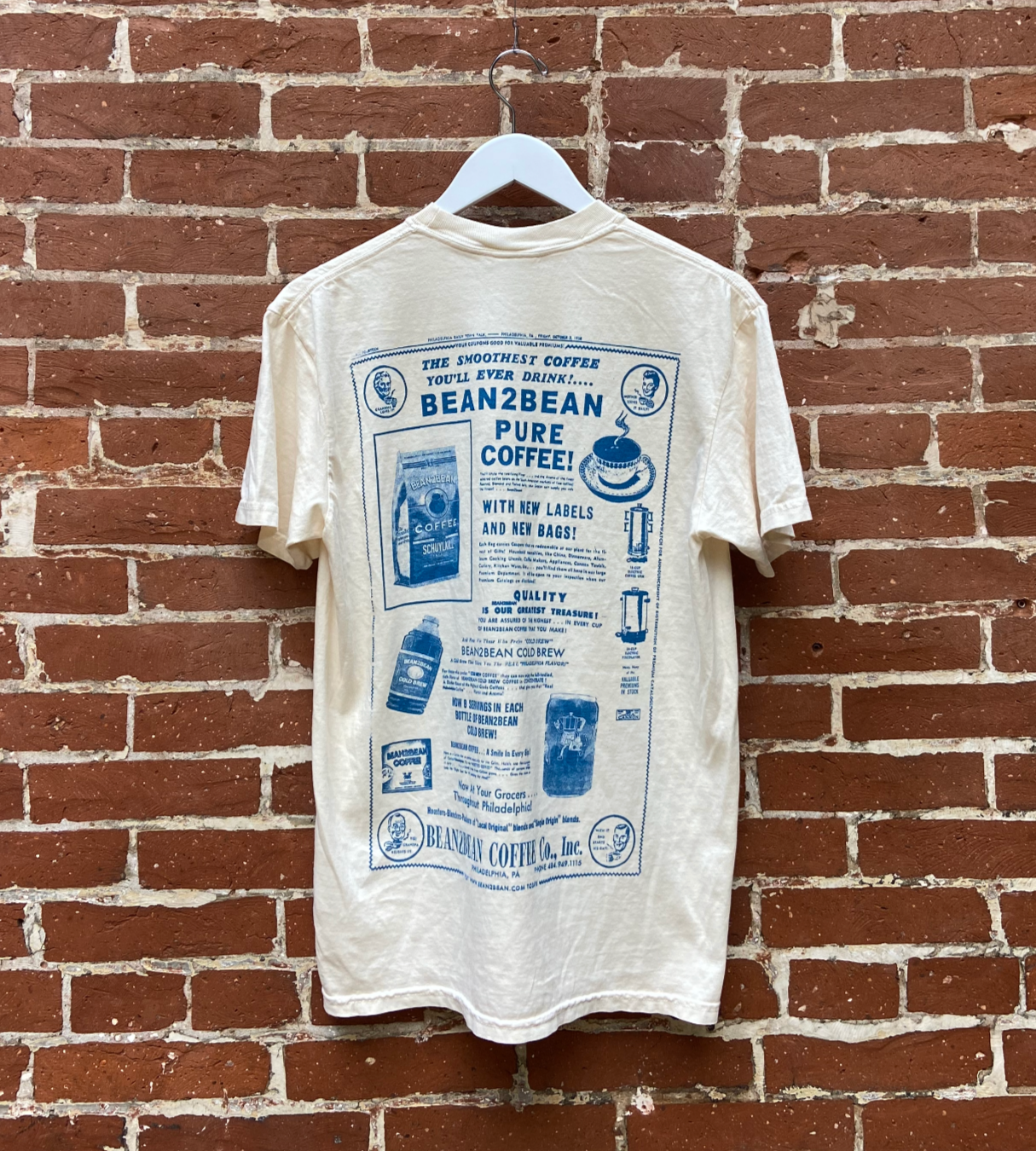 Inspired by vintage coffee advertising and newspaper design. Choose between Comfort Colors white or ivory short-sleeve T-shirt. DESIGNER: Hannah Kneisley PRINTER: Absurd Printworks