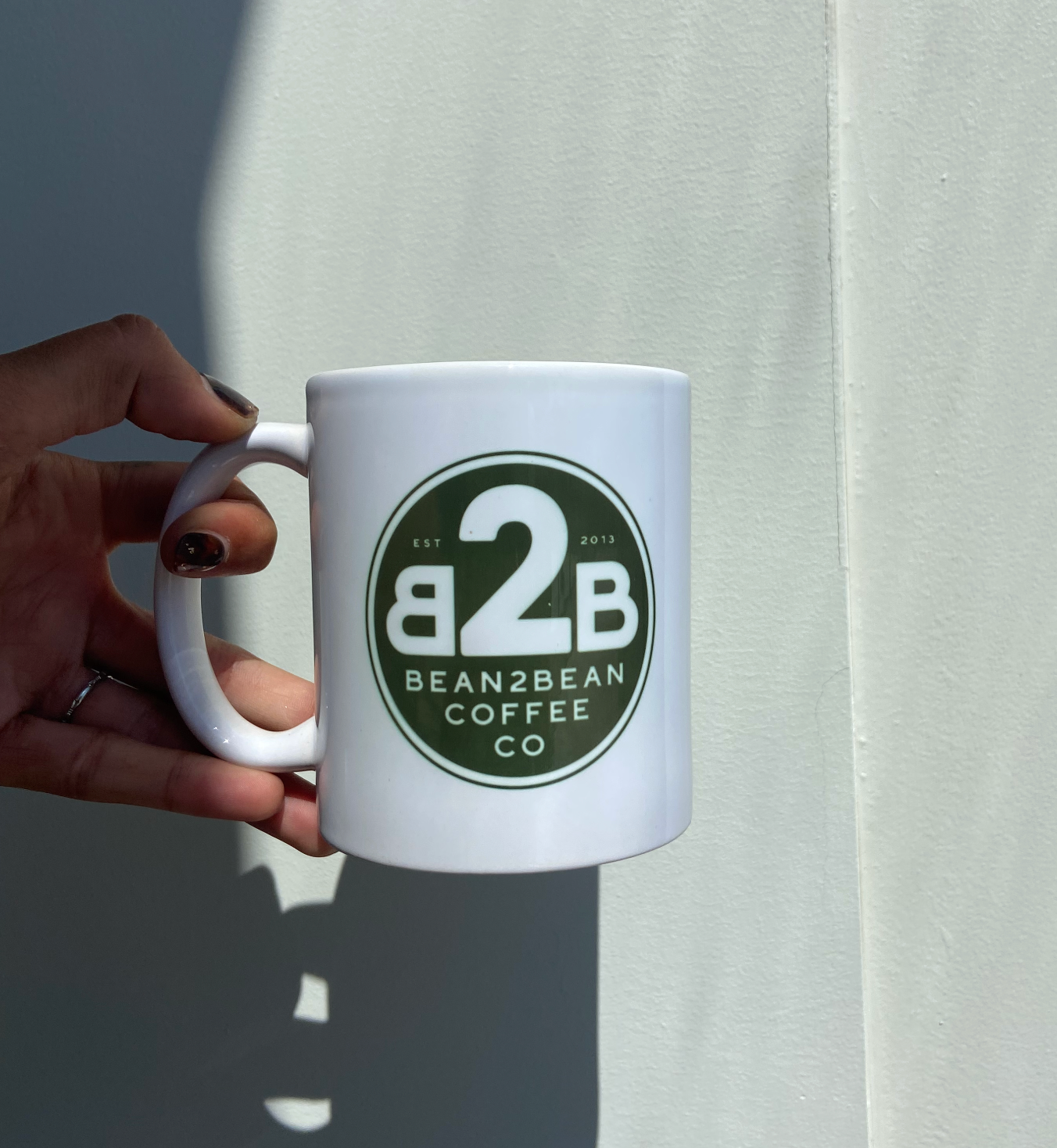 The 90's mug we made custom for our commercial became a bit too poular- so we made more! The Bean2Bean classic 90's mug. Designer - Hannah Kneisley