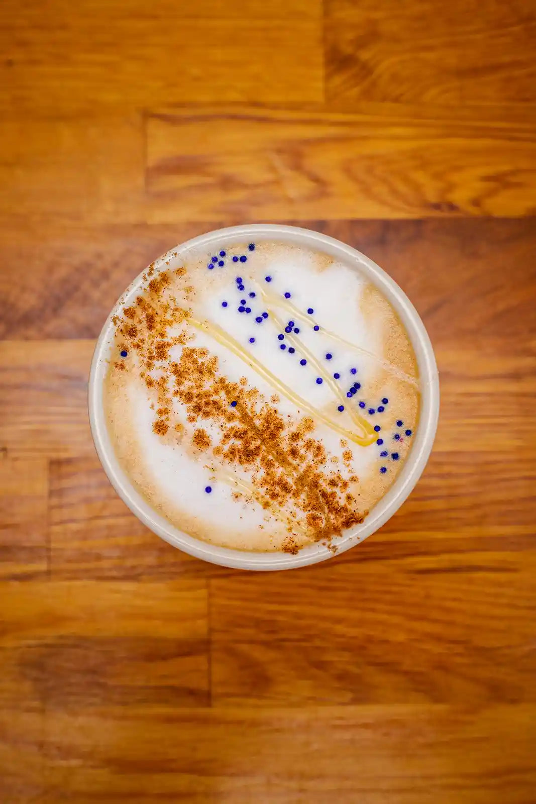 Cup of coffee with a wooden surface