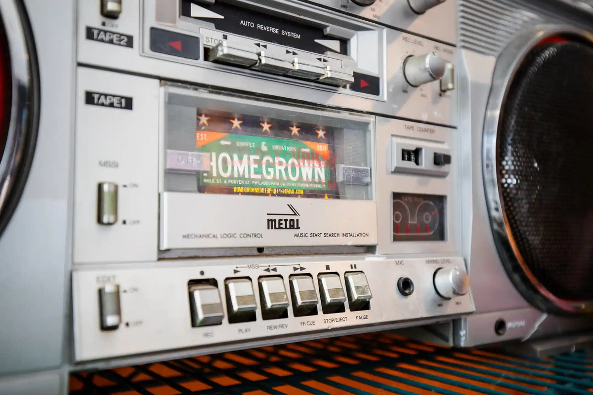 Vintage-style stereo with cassette player and 'Homegrown' label