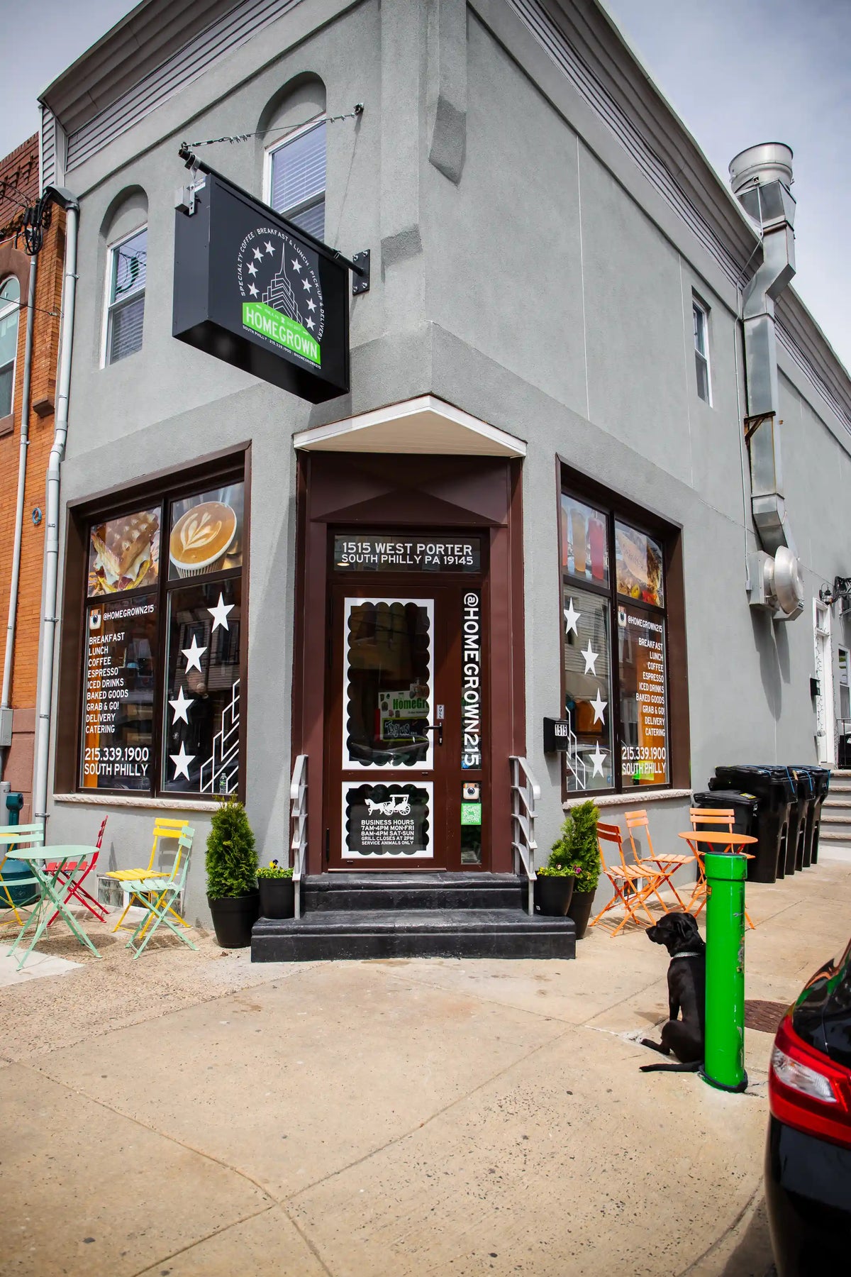 Storefront with a sign and window display on a city street