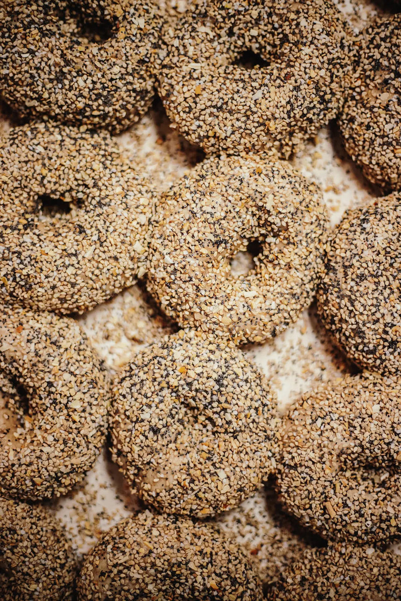 Close-up of everything bagels with circular patterns