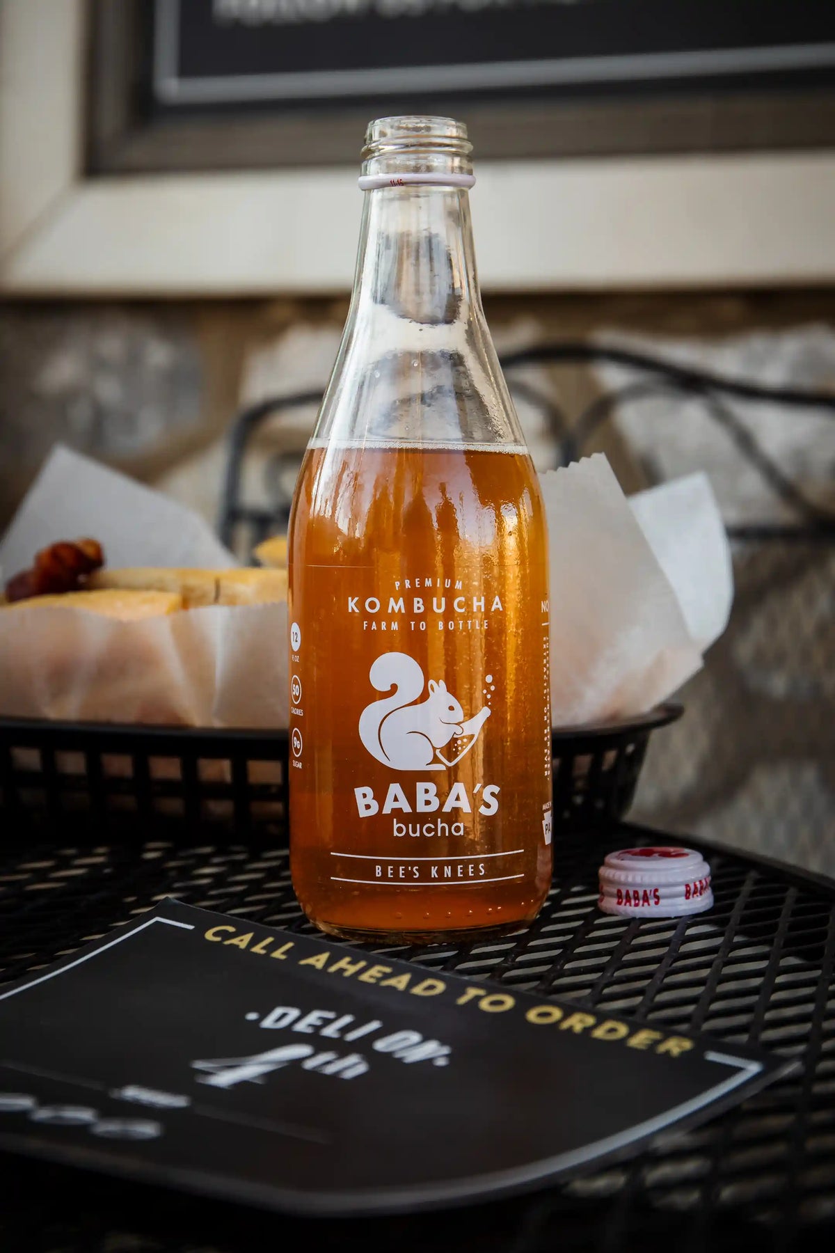 Baba's Bucha Bee's Knees on metal table