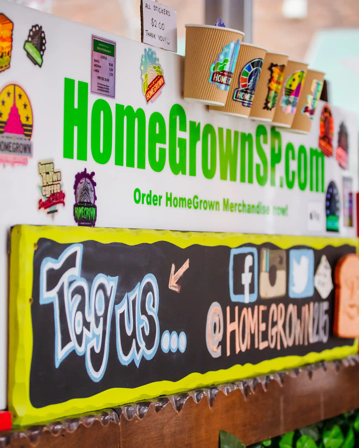 Display with 'HomeGrownSP.com' branding and promotional text on a whiteboard.